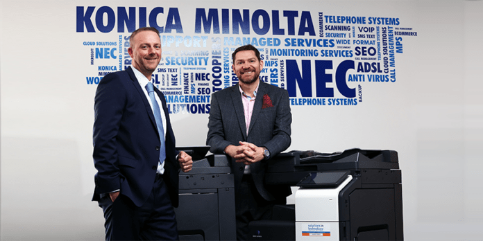 Konica Minolta and Solutions In Technology celebrating 20 years of partnership success.